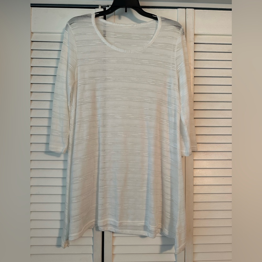 Sheer white top three quarter length sleeves